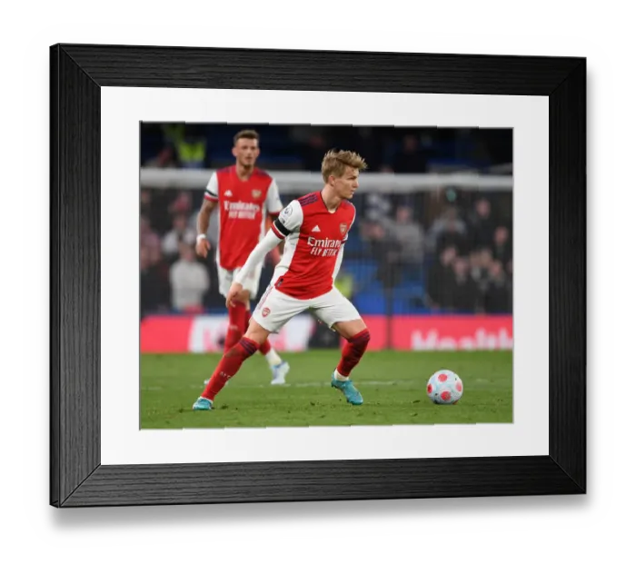 Framed Print : Martin Odegaard Faces Off Against Chelsea in Premier League Showdown Framed Print : Martin Odegaard Faces Off Against Chelsea in Premier League Showdown