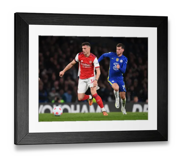 Framed Print : Granit Xhaka vs. Mason Mount: Battle in the Heart of the Premier League Clash between Chelsea and Arsenal