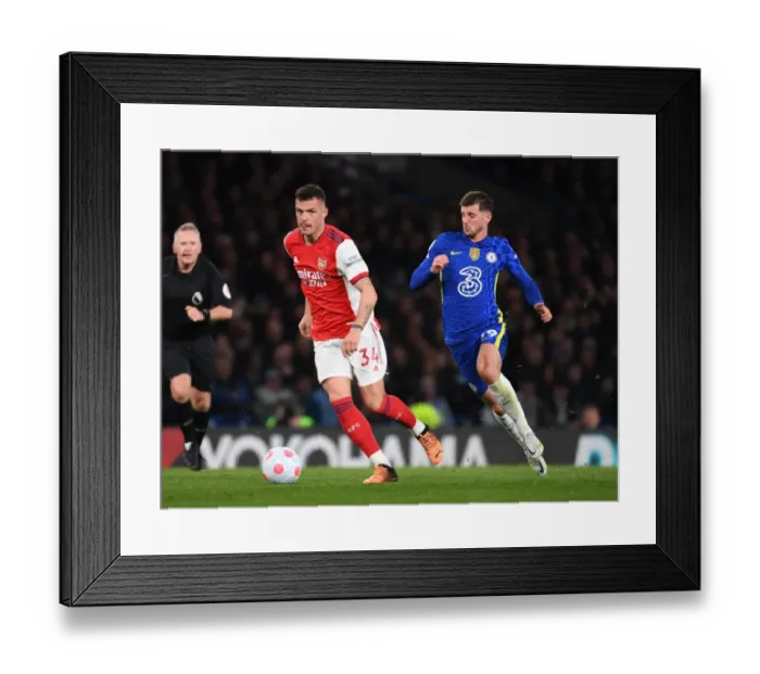Framed Print : Xhaka vs. Mount: Battle in the Heart of the Premier League Clash - Chelsea vs. Arsenal, 2021-22