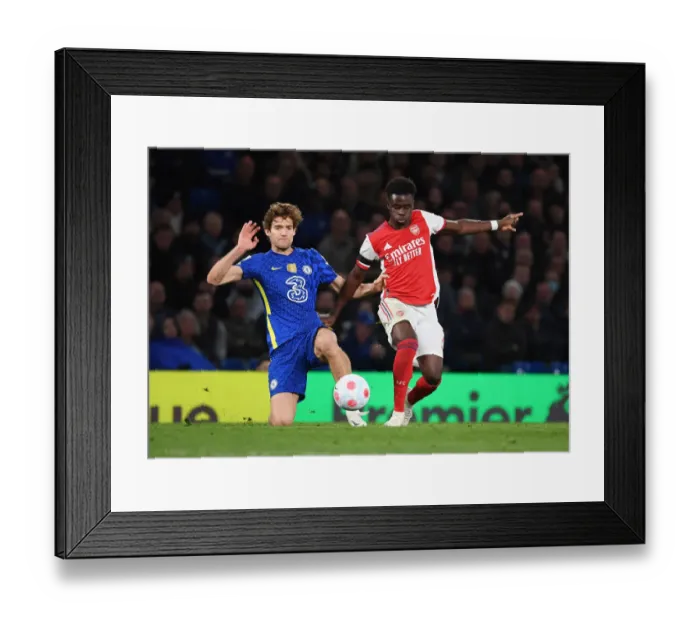 Framed Print : Bukayo Saka Outsmarts Marcos Alonso: A Premier League Showdown at Stamford Bridge, 2021-22 Framed Print : Bukayo Saka Outsmarts Marcos Alonso: A Premier League Showdown at Stamford Bridge, 2021-22