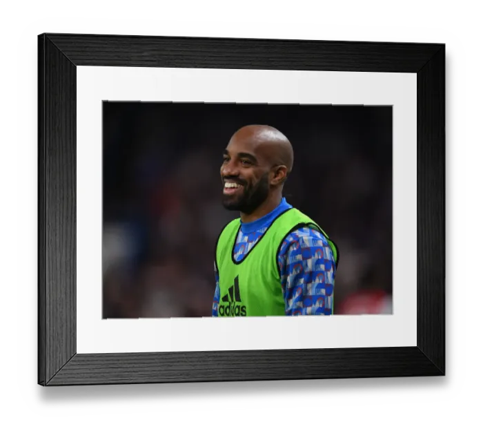 Framed Print : Alexis Lacazette's Playful Moment with Arsenal Fans Amidst Chelsea Rivalry (Premier League 2021-22)