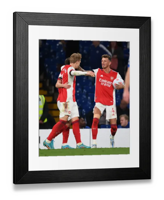 Framed Print : Martin Odegaard and Ben White: Arsenal's Winning Moment at Stamford Bridge (Chelsea vs Arsenal, 2021-22) Framed Print : Martin Odegaard and Ben White: Arsenal's Winning Moment at Stamford Bridge (Chelsea vs Arsenal, 2021-22)