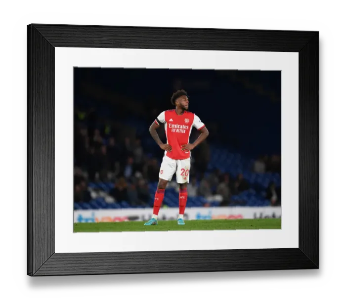 Framed Print : Arsenal's Nuno Tavares Faces Off Against Chelsea at Stamford Bridge - Premier League 2021-22
