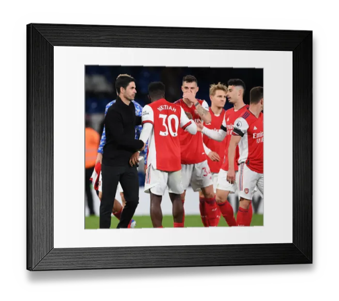 Framed Print : Arsenal Celebrate Hard-Fought Victory Over Chelsea in Premier League Showdown