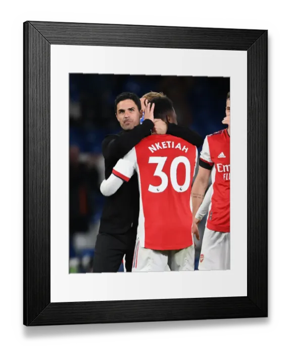Framed Print : Mikel Arteta and Eddie Nketiah Celebrate Arsenal's Win at Chelsea (April 2022)