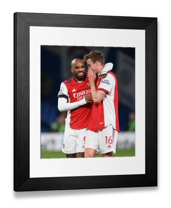Framed Print : Arsenal's Unforgettable Win: Lacazette and Holding's Thrilling Celebration vs. Chelsea (April 2022)