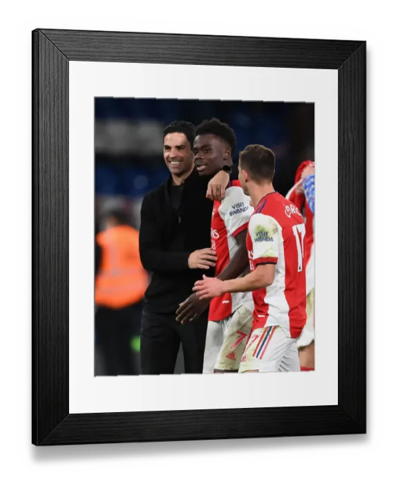 Framed Print : Mikel Arteta and Bukayo Saka Celebrate Arsenal's Win at Chelsea (2021-22)
