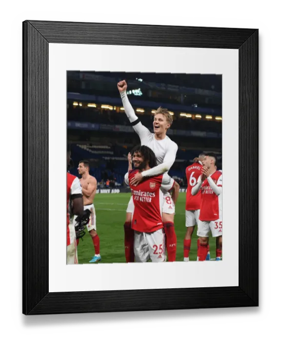 Framed Print : Arsenal's Glory: Celebrating a Hard-Fought Victory Over Chelsea in the Premier League