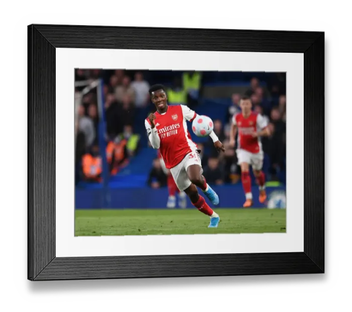 Framed Print : Nketiah vs. Chelsea: Arsenal Star Faces Off at Stamford Bridge in Premier League Clash 2021-22