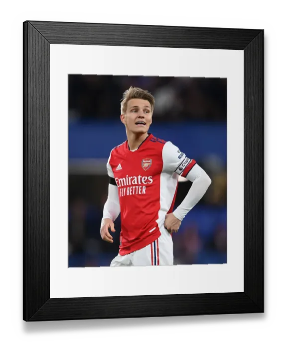 Framed Print : Martin Odegaard vs. Chelsea: A Premier League Battle at Stamford Bridge