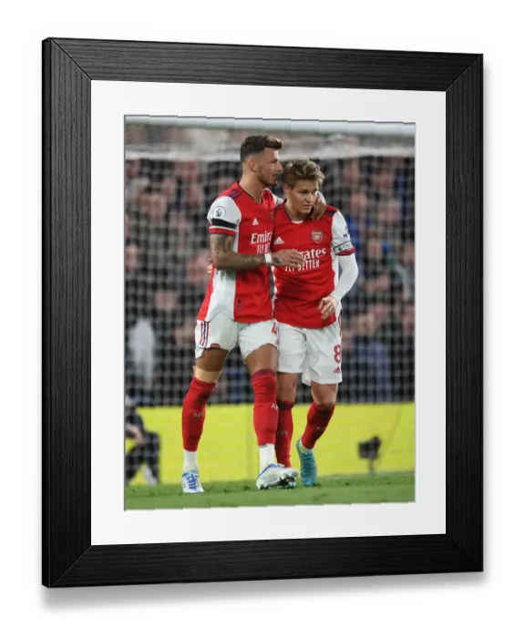 Framed Print : Arsenal's Embrace: Ben White and Martin Odegaard Unite Amidst Chelsea Rivalry