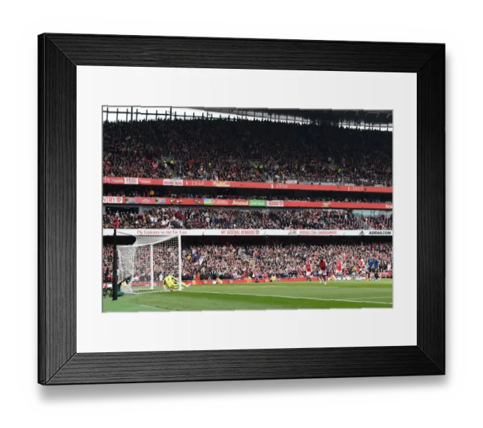 Framed Print : Saka Scores Dramatic Penalty: Arsenal Secures Victory Over Manchester United in Epic Premier League Clash