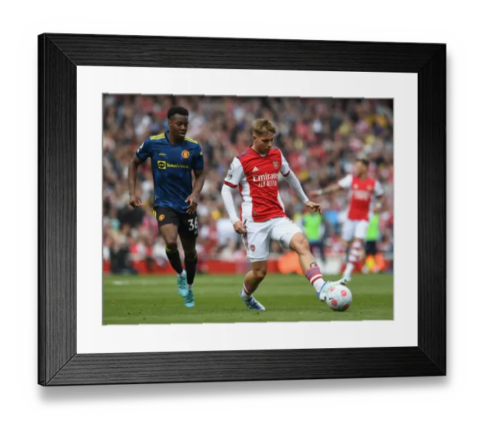 Framed Print : Arsenal vs Manchester United: Emile Smith Rowe vs Anthony Elanga - Intense Battle in the Premier League Framed Print : Arsenal vs Manchester United: Emile Smith Rowe vs Anthony Elanga - Intense Battle in the Premier League