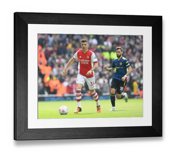 Framed Print : Granit Xhaka in Action: Arsenal vs Manchester United, Premier League 2021-22 Framed Print : Granit Xhaka in Action: Arsenal vs Manchester United, Premier League 2021-22