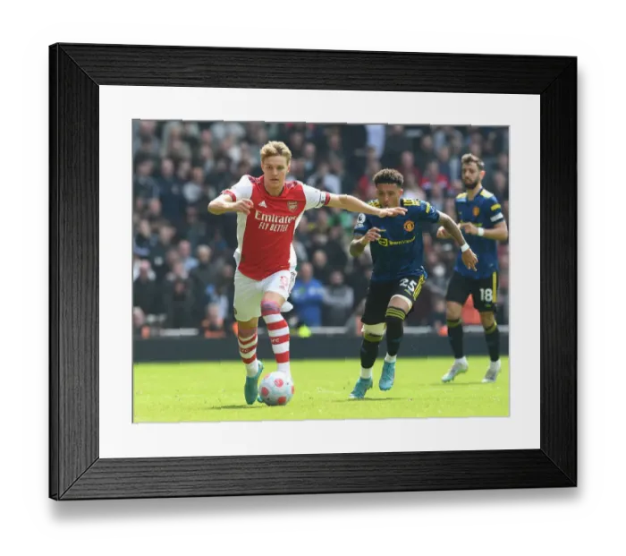 Framed Print : Clash of Talents: Arsenal's Odegaard vs Man Utd's Sancho in Premier League Showdown Framed Print : Clash of Talents: Arsenal's Odegaard vs Man Utd's Sancho in Premier League Showdown
