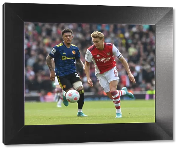 Clash of Talents: Arsenal's Martin Odegaard vs Manchester United's Jadon Sancho in the Premier League Showdown
