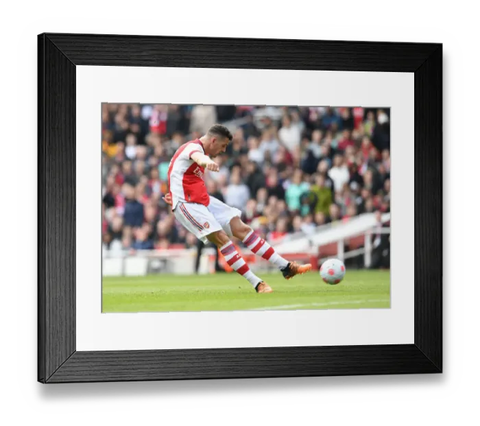 Framed Print : Xhaka Scores the Third: Arsenal Triumphs Over Manchester United in Premier League Showdown (2021-22)