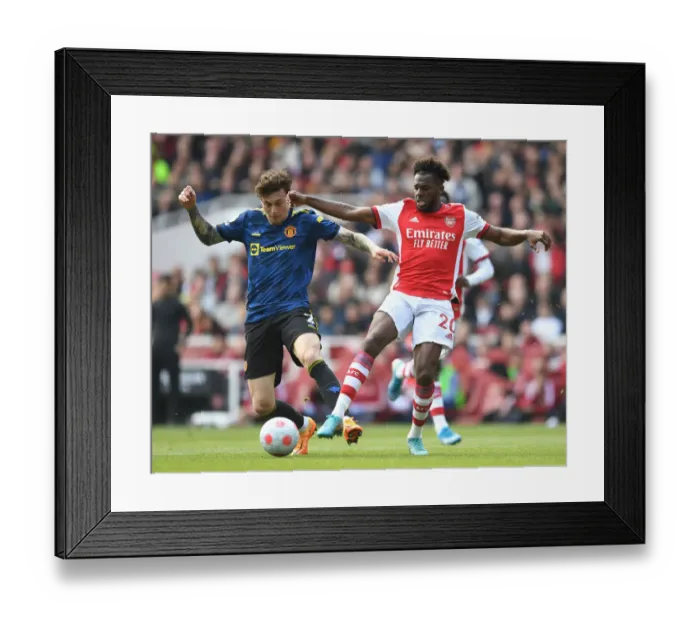 Framed Print : Clash of Titans: Arsenal vs Manchester United - Premier League Showdown