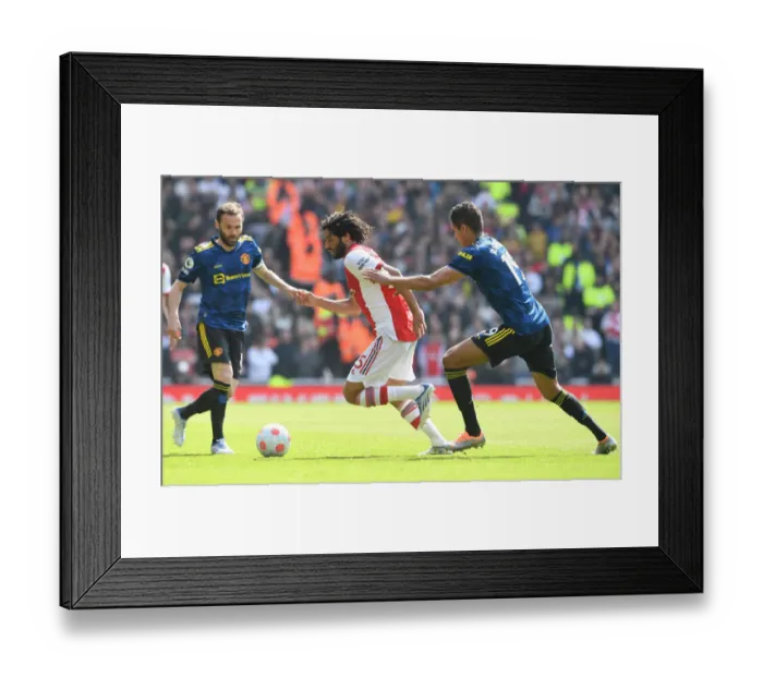 Framed Print : Arsenal vs Manchester United: Elneny vs Varane Clash in the Premier League
