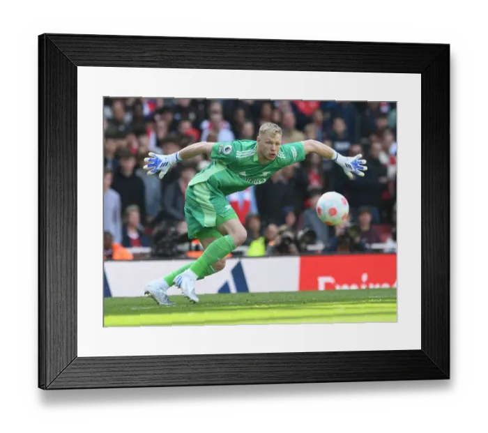 Framed Print : Arsenal's Aaron Ramsdale: Unforgettable Heroics in the Premier League Clash Against Manchester United (April 2022)