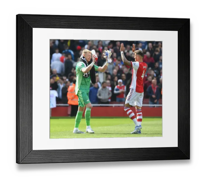 Framed Print : Arsenal's Victory: Ramsdale and White Celebrate Over Manchester United