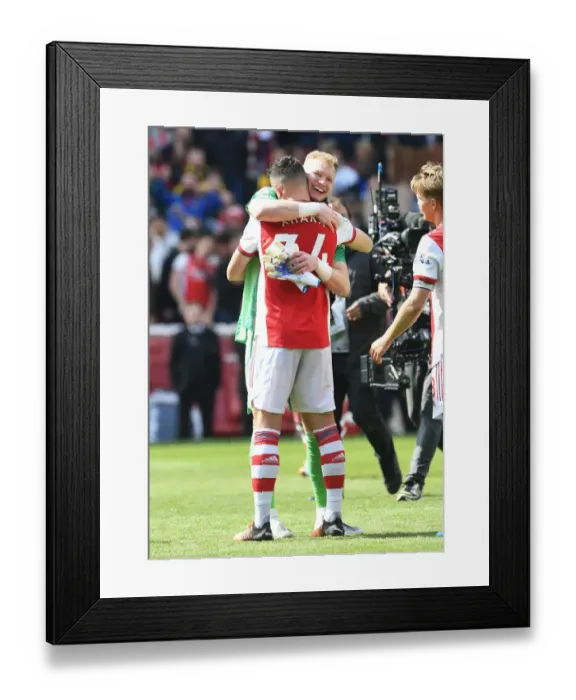 Framed Print : Arsenal's Victory: Ramsdale and Xhaka Celebrate Over Manchester United Framed Print : Arsenal's Victory: Ramsdale and Xhaka Celebrate Over Manchester United