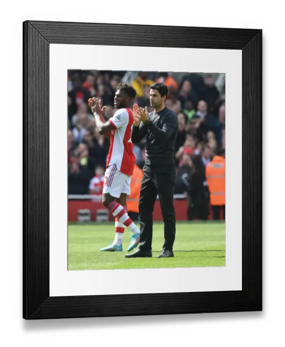 Framed Print : Arsenal's Mikel Arteta Celebrates with Fans after Victory over Manchester United (2021-22) Framed Print : Arsenal's Mikel Arteta Celebrates with Fans after Victory over Manchester United (2021-22)