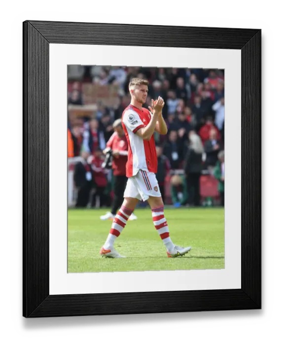 Framed Print : Arsenal's Rob Holding Celebrates with Fans after Victory over Manchester United (2021-22) Framed Print : Arsenal's Rob Holding Celebrates with Fans after Victory over Manchester United (2021-22)