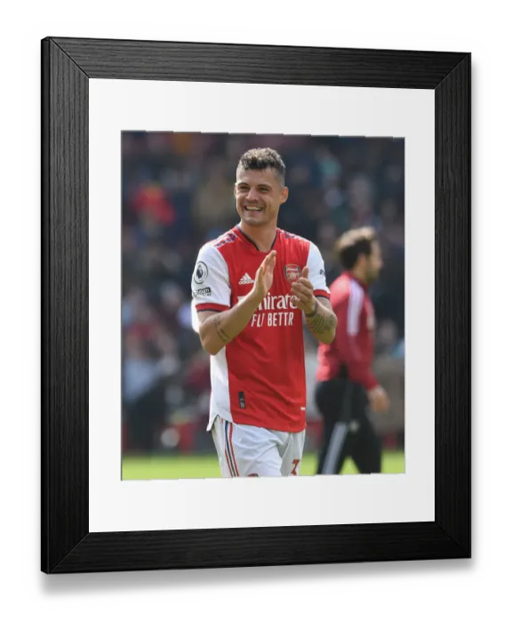 Framed Print : Arsenal's Granit Xhaka Celebrates with Fans After Arsenal vs Manchester United Win, 2021-22 Premier League Framed Print : Arsenal's Granit Xhaka Celebrates with Fans After Arsenal vs Manchester United Win, 2021-22 Premier League