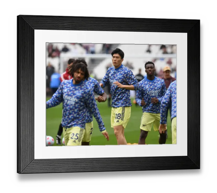 Framed Print : Arsenal's Tomiyasu Warming Up Ahead of West Ham Clash - Premier League 2021-22 Framed Print : Arsenal's Tomiyasu Warming Up Ahead of West Ham Clash - Premier League 2021-22