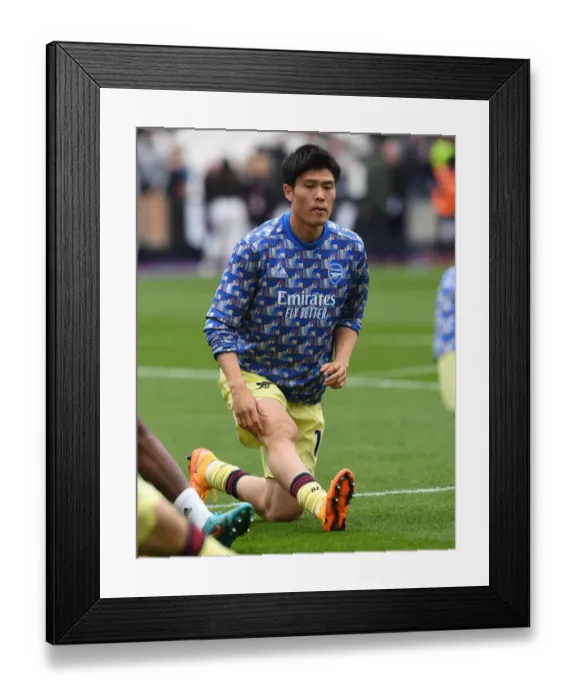 Framed Print : Arsenal's Tomiyasu Readies for Premier League Battle against West Ham Framed Print : Arsenal's Tomiyasu Readies for Premier League Battle against West Ham