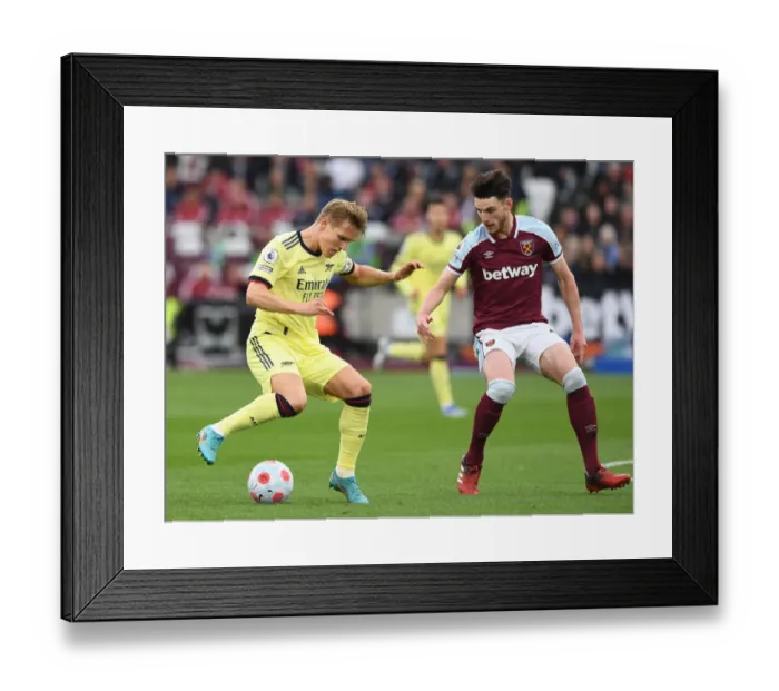 Framed Print : Martin Odegaard vs. Declan Rice: Battle in the Premier League - Arsenal vs. West Ham United (2021-22)