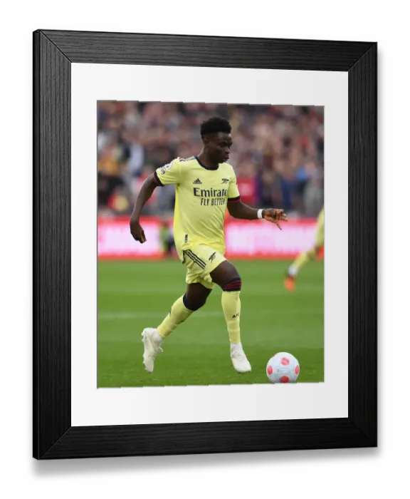 Framed Print : Bukayo Saka in Action: West Ham United vs Arsenal, Premier League 2021-22