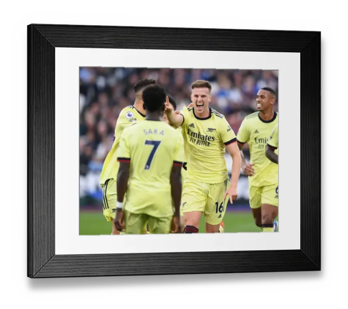 Framed Print : Rising High: Rob Holding Scores the Winning Goal for Arsenal against West Ham United in Premier League Showdown