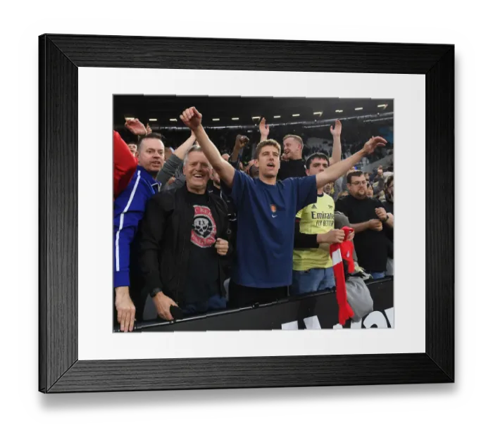 Framed Print : Arsenal's Premier League Triumph: Fans Euphoric Reaction vs. West Ham United