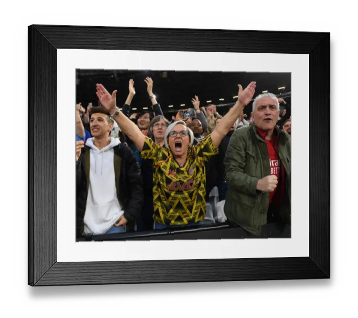 Framed Print : Arsenal Fans Euphoric Victory Celebration vs. West Ham United in Premier League Framed Print : Arsenal Fans Euphoric Victory Celebration vs. West Ham United in Premier League
