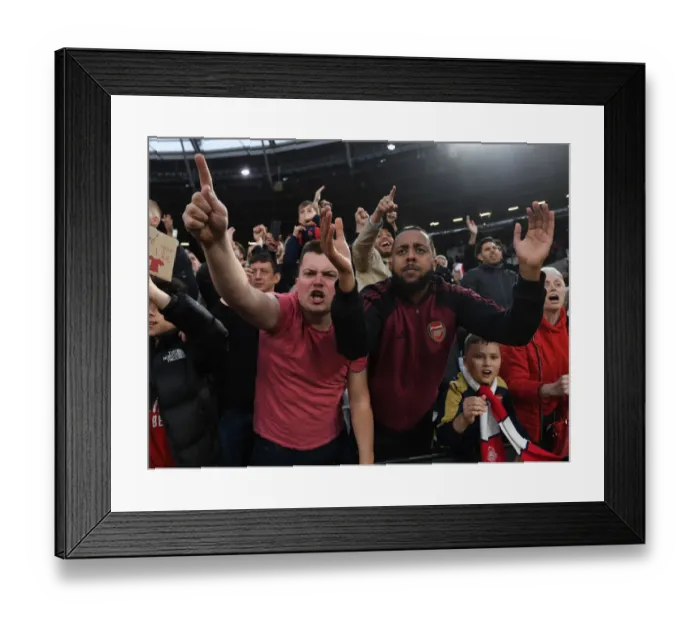 Framed Print : Arsenal Fans Go Wild: Premier League Victory Celebration vs. West Ham United Framed Print : Arsenal Fans Go Wild: Premier League Victory Celebration vs. West Ham United