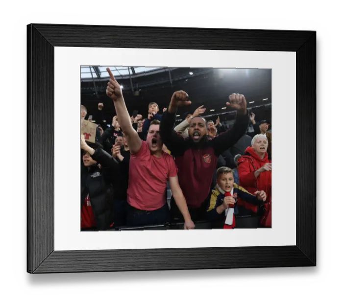 Framed Print : Arsenal Fans Celebrate Dramatic Win Against West Ham United in Premier League Showdown Framed Print : Arsenal Fans Celebrate Dramatic Win Against West Ham United in Premier League Showdown