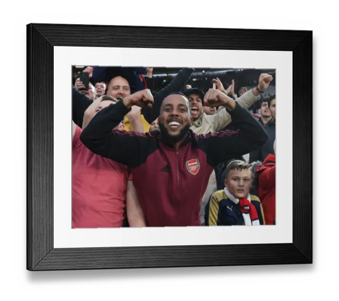 Framed Print : Arsenal Fans Triumphant Euphoria: Celebrating a Hard-Fought Premier League Victory over West Ham United Framed Print : Arsenal Fans Triumphant Euphoria: Celebrating a Hard-Fought Premier League Victory over West Ham United