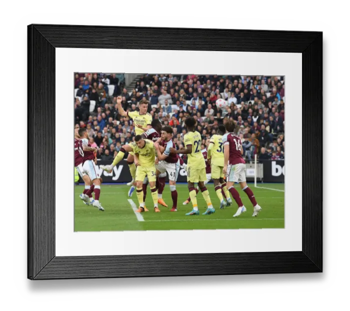 Framed Print : Robby Holding's Thrilling Winner: Arsenal Secures Victory Over West Ham United in Premier League 2021-22