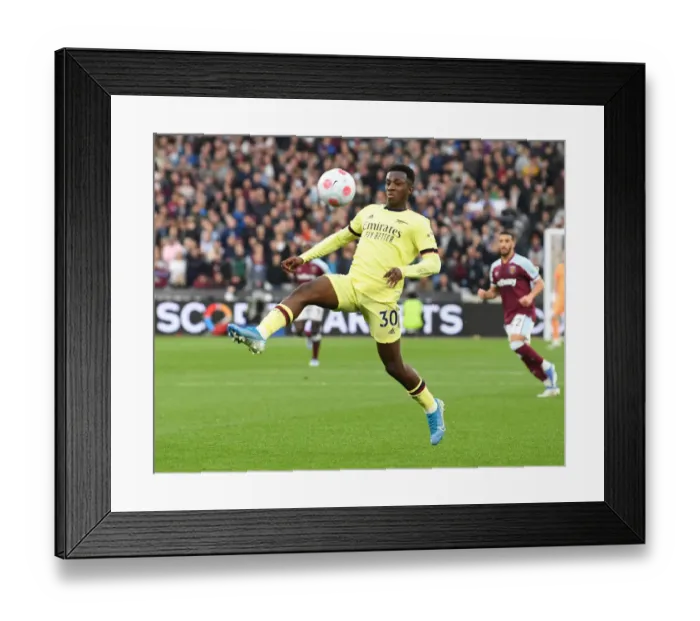Framed Print : Arsenal's Eddie Nketiah Faces Off Against West Ham in Intense Premier League Clash Framed Print : Arsenal's Eddie Nketiah Faces Off Against West Ham in Intense Premier League Clash