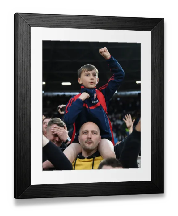 Framed Print : Arsenal Fans Celebrate Premier League Victory over West Ham United