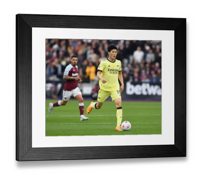 Framed Print : Takehiro Tomiyasu in Action: West Ham United vs. Arsenal, Premier League 2021-22 Framed Print : Takehiro Tomiyasu in Action: West Ham United vs. Arsenal, Premier League 2021-22