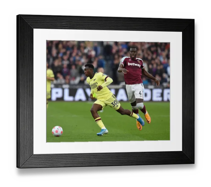Framed Print : Nketiah vs. Zouma: A Battle of Intense Determination in Arsenal's Clash with West Ham