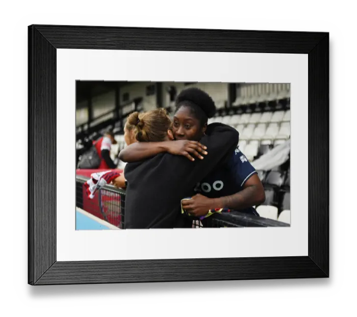 Framed Print : Embrace of Victory: Arsenal Women vs. Aston Villa Women in FA WSL Showdown