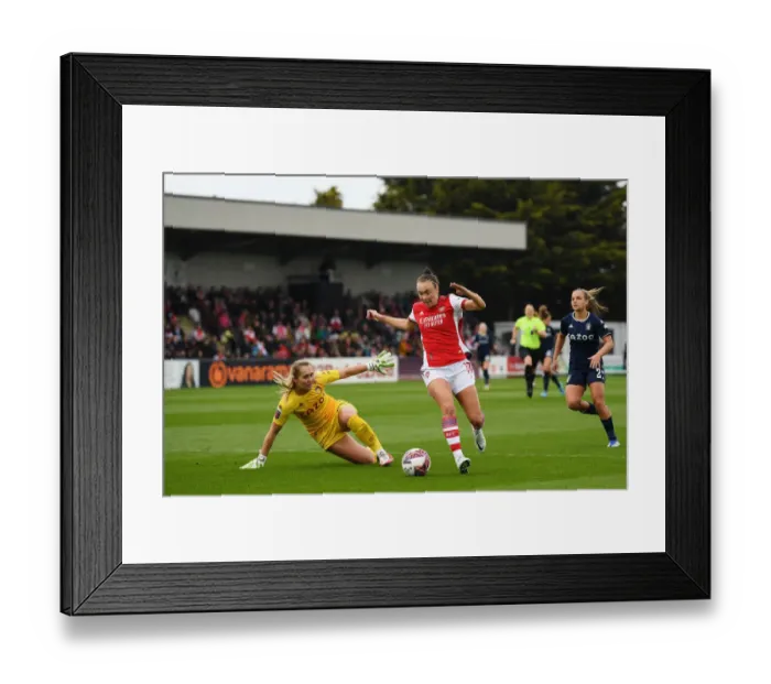 Framed Print : Arsenal's Caitlin Foord Outmaneuvers Defender in Exciting FA WSL Clash