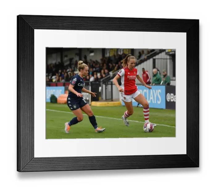 Framed Print : Intense Battle: Arsenal Women vs Aston Villa Women in FA WSL Match (2021-22)