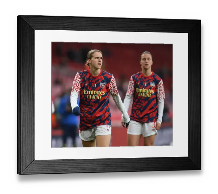 Framed Print : Arsenal's Viviane Miedema: Focused Pre-Match Routine Ahead of Arsenal Women vs. Tottenham Hotspur FA WSL Showdown