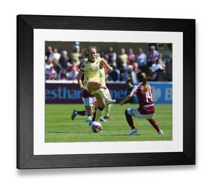 Framed Print : Arsenal vs. West Ham United: FA WSL Showdown at Chigwell Construction Stadium