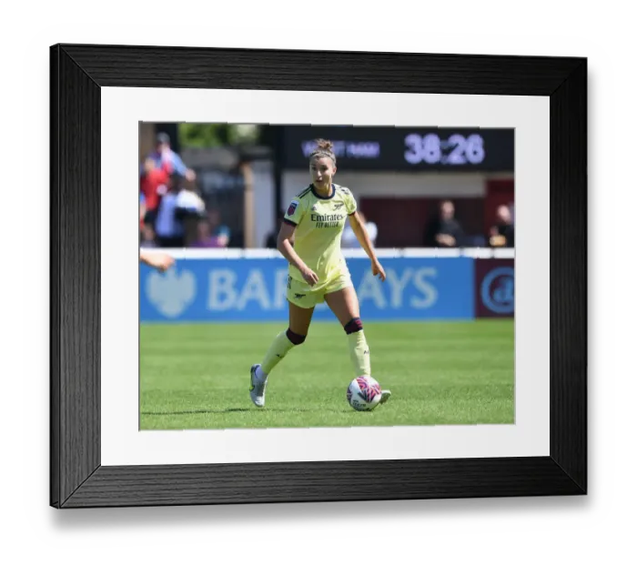 Framed Print : Arsenal vs. West Ham United: FA WSL Clash at Chigwell Construction Stadium